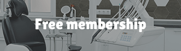 Gray dental chair with free membership text